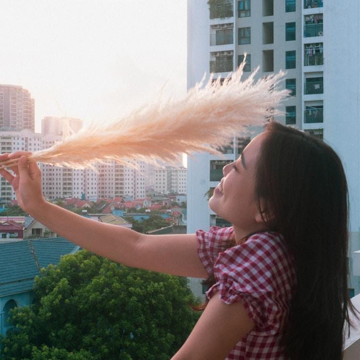 A different designer reviewing corporate floral arrangements for Bright Tone Matrix
